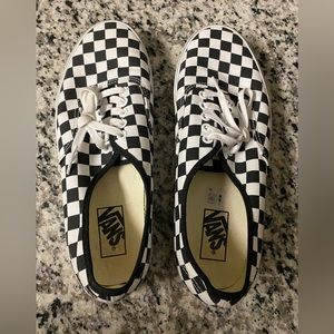 Black and white checkered Vans